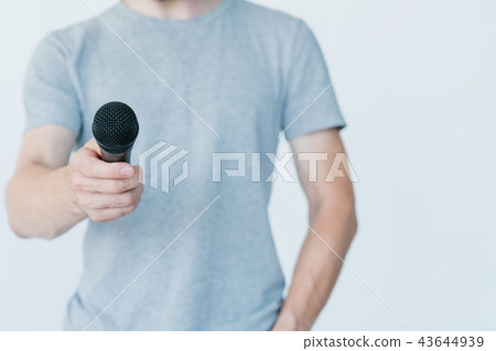 mass media journalism broadcast hold mic interview 43644939
