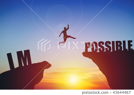 Man jumping on impossible text over cliff on sunset background Man jumping on impossible text over cliff on sunset background 43644967