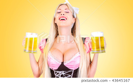 oktoberfest woman with two mugs light beer oktoberfest woman with two mugs light beer 43645167