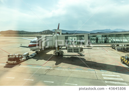 Airplane Boarding on the airport before departure. Airplane Boarding on the airport before departure. 43645806