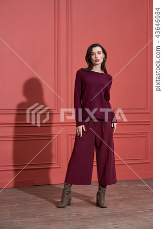 Model posing in studio in trendy clothes Model posing in studio in trendy clothes 43646984