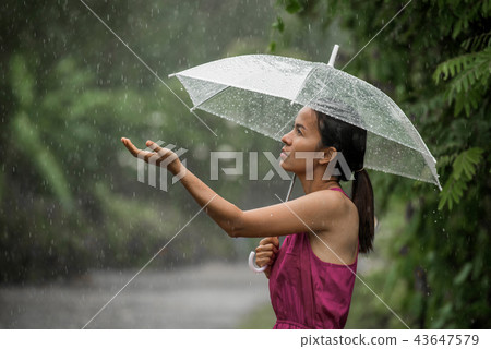 Beautiful young woman so sad as she holds out 43647579