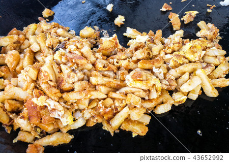 Fried carrot cake or Cai Tau Kueh Fried carrot cake or Cai Tau Kueh 43652992