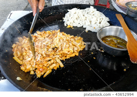 Fried carrot cake or Cai Tau Kueh Fried carrot cake or Cai Tau Kueh 43652994