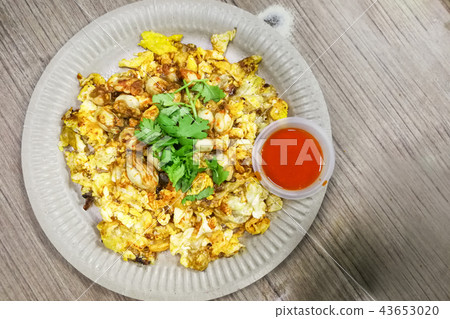 Fried egg oyster, popular food in Penang, Malaysia Fried egg oyster, popular food in Penang, Malaysia 43653020