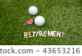 Happy Retirement to golfer with golf ball on grass 43653216