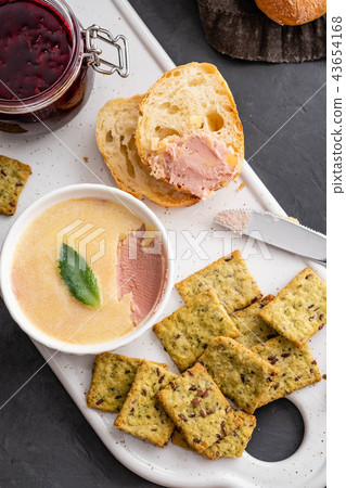 Fresh homemade chicken pate with bread on a black background. Copy space. Fresh homemade chicken pate with bread on a black background. Copy space. 43654168