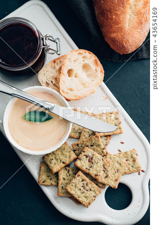 Fresh homemade chicken pate with bread on a black background. Copy space. Fresh homemade chicken pate with bread on a black background. Copy space. 43654169