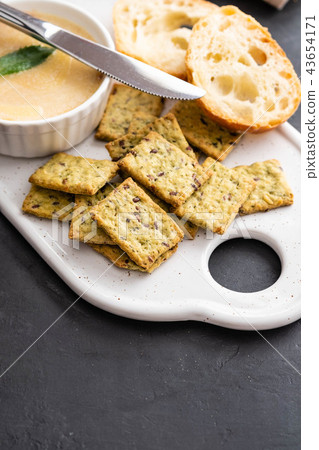 Fresh homemade chicken pate with bread on a black background. Copy space. Fresh homemade chicken pate with bread on a black background. Copy space. 43654171