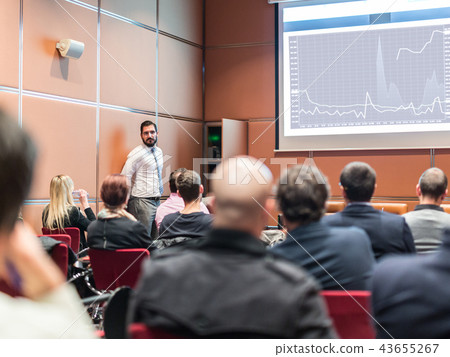 Skiled Public Speaker Giving a Talk at Business Meeting. 43655267