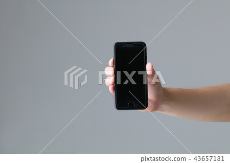 Smartphone and hand 43657181