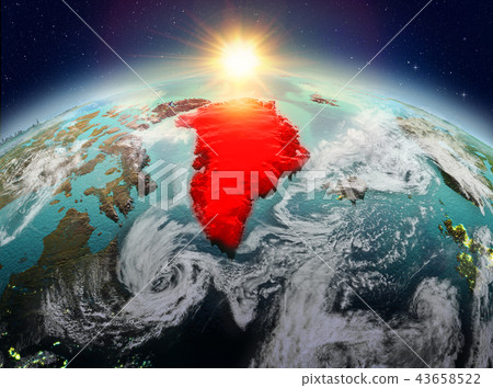 Greenland from space in sunrise 43658522