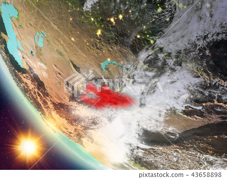 Sunset above Kyrgyzstan on Earth 43658898