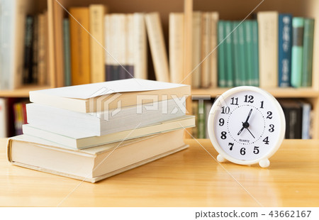 Reading bookshelf books clock time 43662167