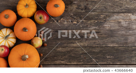 Autumn harvest on wooden table Autumn harvest on wooden table 43666640