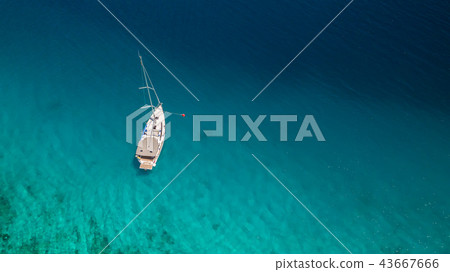 Sailing boat on open water, aerial view Sailing boat on open water, aerial view 43667666