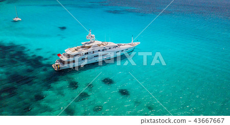 Big luxury yacht anchoring in shallow water, Big luxury yacht anchoring in shallow water, 43667667