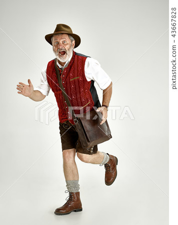 Portrait of Oktoberfest man, wearing a traditional Bavarian clothes 43667828