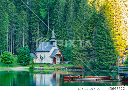 Morning view of small old church at Lake Braies Morning view of small old church at Lake Braies 43668322