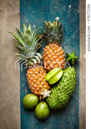 Pineapples and green fruits 43671266