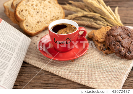 Hot coffee cup and breakfast 43672487