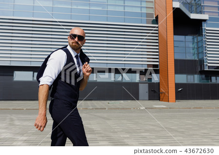 Young and successful. Handsome young man in full suit 43672630