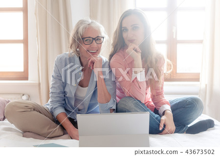 Two women starting their small business from home together 43673502