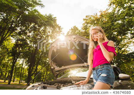 Girl make a call about broken transport 43674080