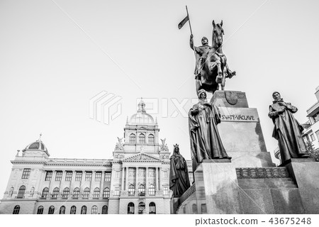 The bronze equestrian statue of St Wenceslas at the Wenceslas Square with historical Neorenaissance The bronze equestrian statue of St Wenceslas at the Wenceslas Square with historical Neorenaissance 43675248