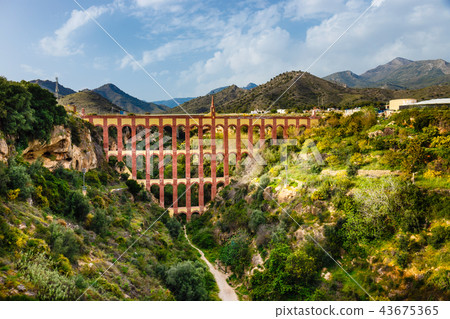 El Puente del Aguila, old aqueduct in Nerja, Spain El Puente del Aguila, old aqueduct in Nerja, Spain 43675365
