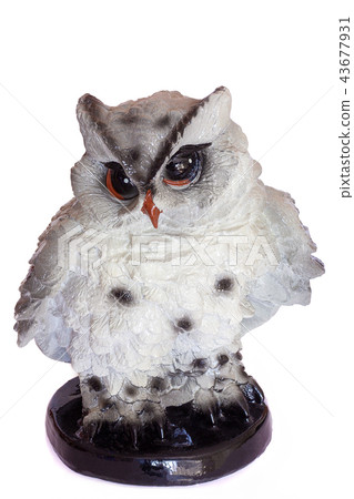 owl statuette isolated on white owl statuette isolated on white 43677931