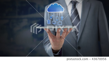 Hand holding tablet with cloud icon and hanging connection devices 43678956