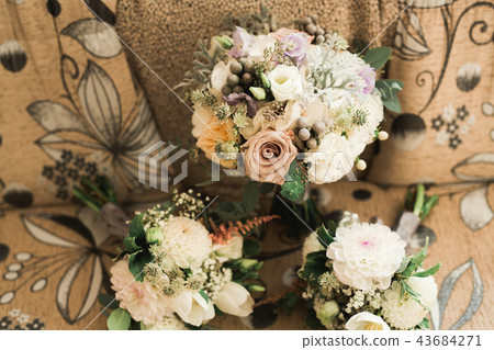 Beautiful wedding bouquet with different flowers, roses Beautiful wedding bouquet with different flowers, roses 43684271