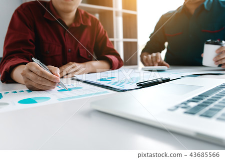 Two businessman team calculate about summary Two businessman team calculate about summary 43685566