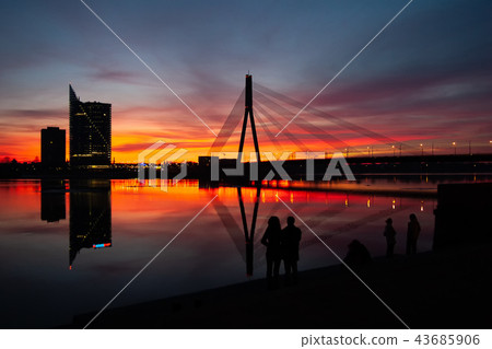 Sunset at the bridge on the Daugava River in Riga 43685906