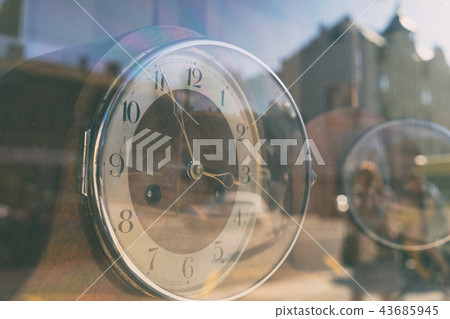 Abstract reflection of city life in hours Abstract reflection of city life in hours 43685945