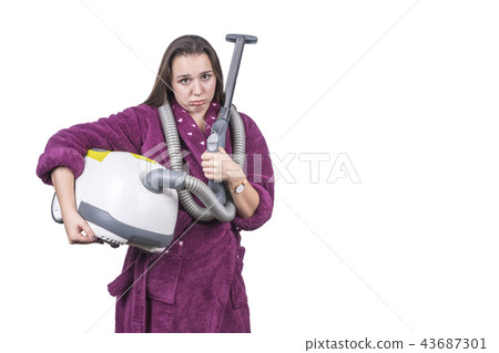 Sad woman with a vacuum cleaner 43687301