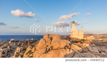 Lighthouse on granite rock formations at Capo Testa, Sardinia, Italy. Lighthouse on granite rock formations at Capo Testa, Sardinia, Italy. 43690512
