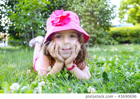 little girl on the lawn 43690696