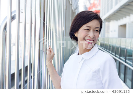 Fifties female doctor nurse Fifties female doctor nurse 43691125