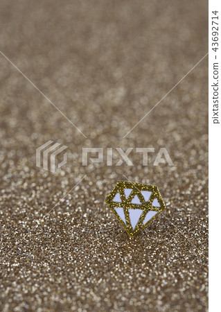 Diamond on gold background 43692714