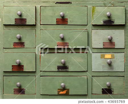 Wooden cabinet with drawers Stock Photo by sergeyskleznev