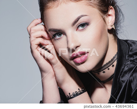 Sexy portrait of an young brunette woman 43694361