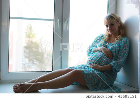 Beautiful girl pregnant blonde 43695151