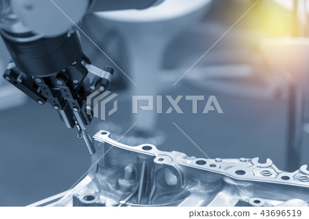 The robotic arm catch the steel plug 43696519