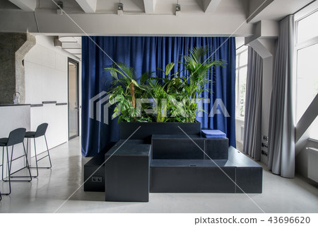 Stylish interior in loft style with gray walls Stylish interior in loft style with gray walls 43696620