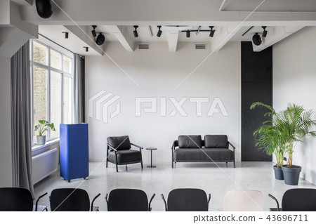 Stylish interior in loft style with gray walls Stylish interior in loft style with gray walls 43696711