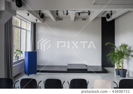 Stylish interior in loft style with gray walls Stylish interior in loft style with gray walls 43696731