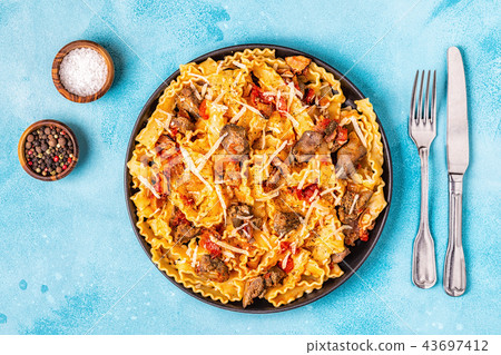 Pasta with chicken liver sauce. 43697412
