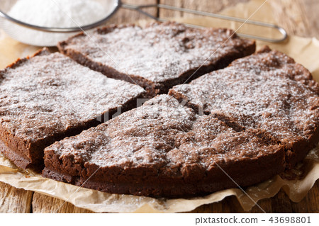 Homemade Swedish chocolate sticky cake close-up Homemade Swedish chocolate sticky cake close-up 43698801